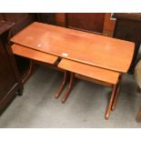 A teak set of three coffee tables,