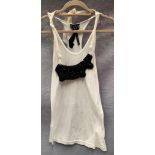 A Poleci ladies vest top, white with black necklace, one size,