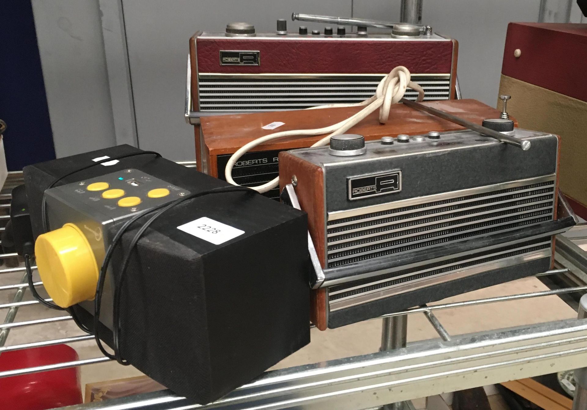 Three Roberts portable radios (no test plugs cut off) and a Sovereign KA-5007 portable radio