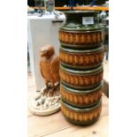 A West German patterned vase and a wood model of a bird of prey with portable box (2)