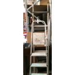 A Youngmans 3 way combination ladder and a pair of Youngman four step stepladders (2)