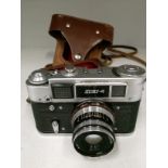 30-4 camera S/N 344528 with tan leather case