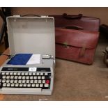 Two brown leather briefcases and a Boots P7800 portable typewriter (3)