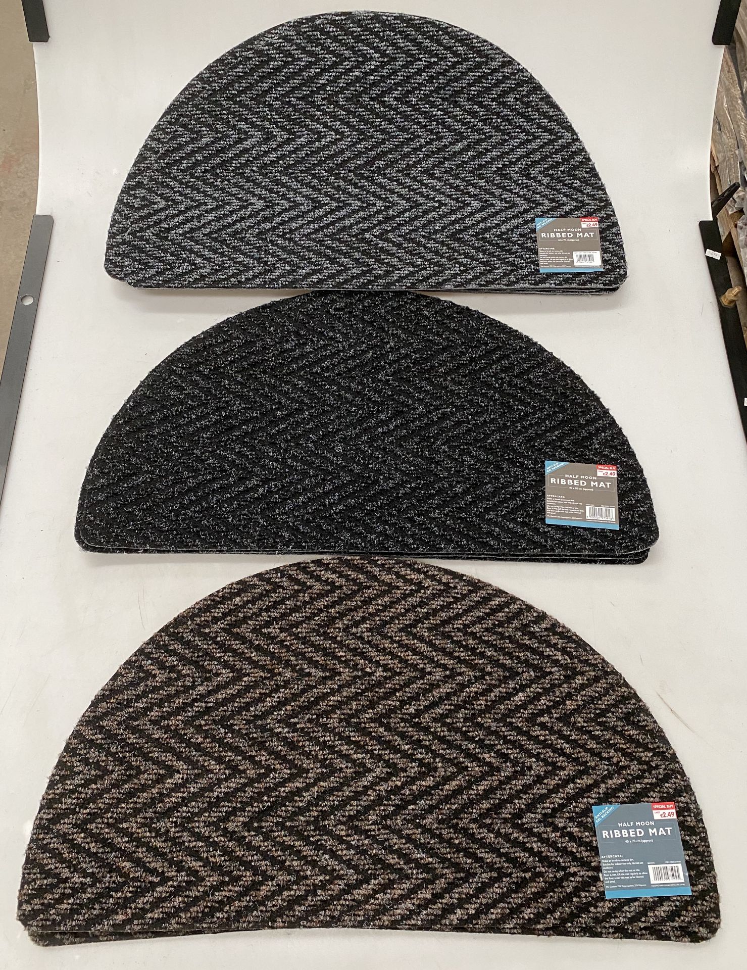 13 x assorted grey/black/brown half moon ribbed mats - 40cm x 70cm approx.