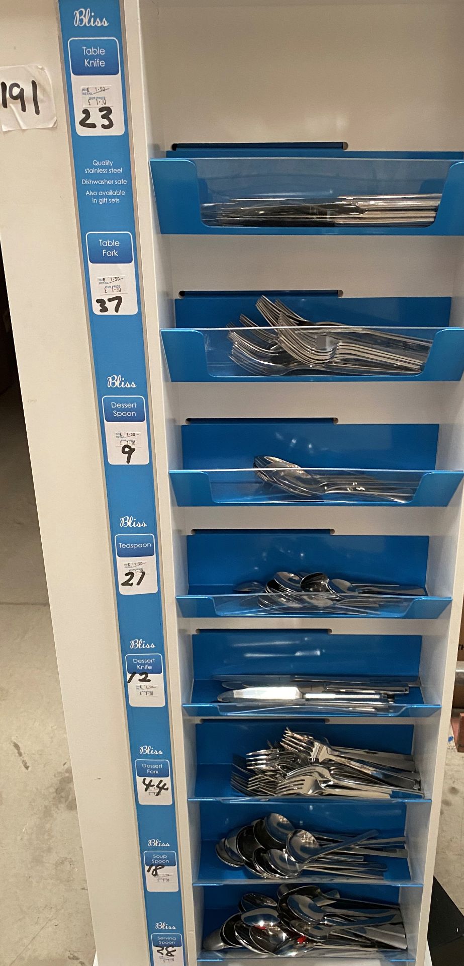 Contents to one side of an 8 shelf display - 191 pieces of Amefa Bliss cutlery - including knives,