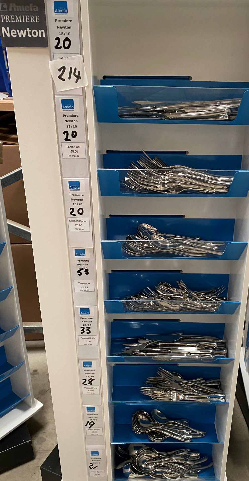 Contents to one side of an 8 shelf display - 214 pieces of Amefa Newton cutlery - including knives,