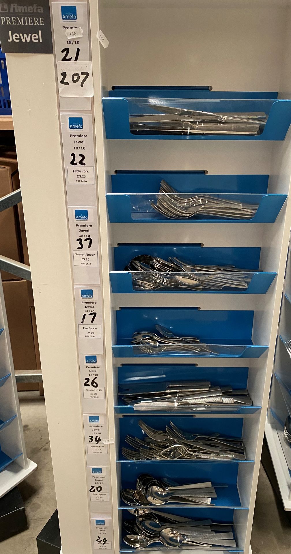 Contents to one side of an 8 shelf display - 207 pieces of Amefa Jewel cutlery - including knives,