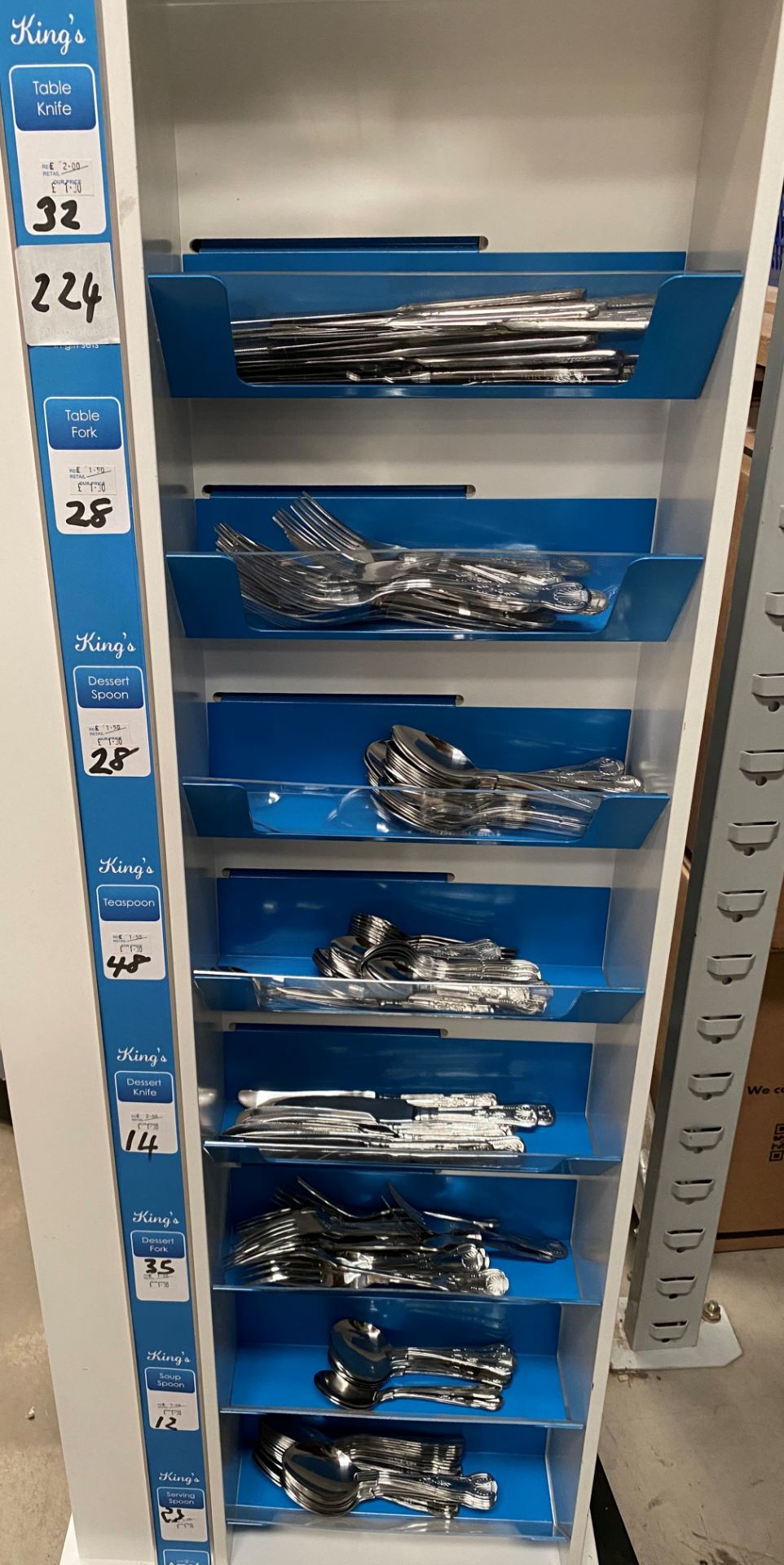 Contents to one side of an 8 shelf display - 224 pieces of Amefa Kings cutlery - including knives,