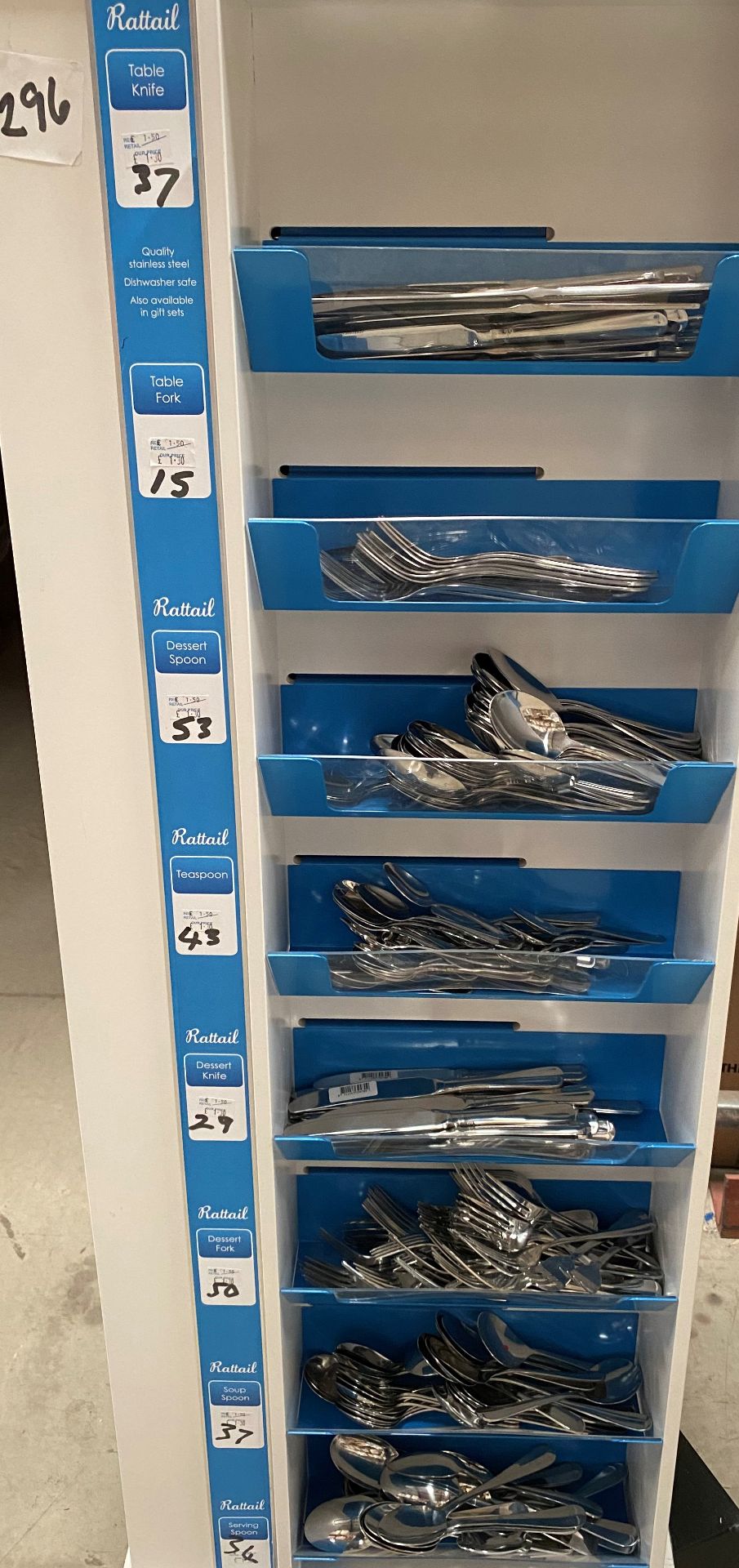 Contents to one side of an 8 shelf display - 296 pieces of Amefa Rattail cutlery - including knives,