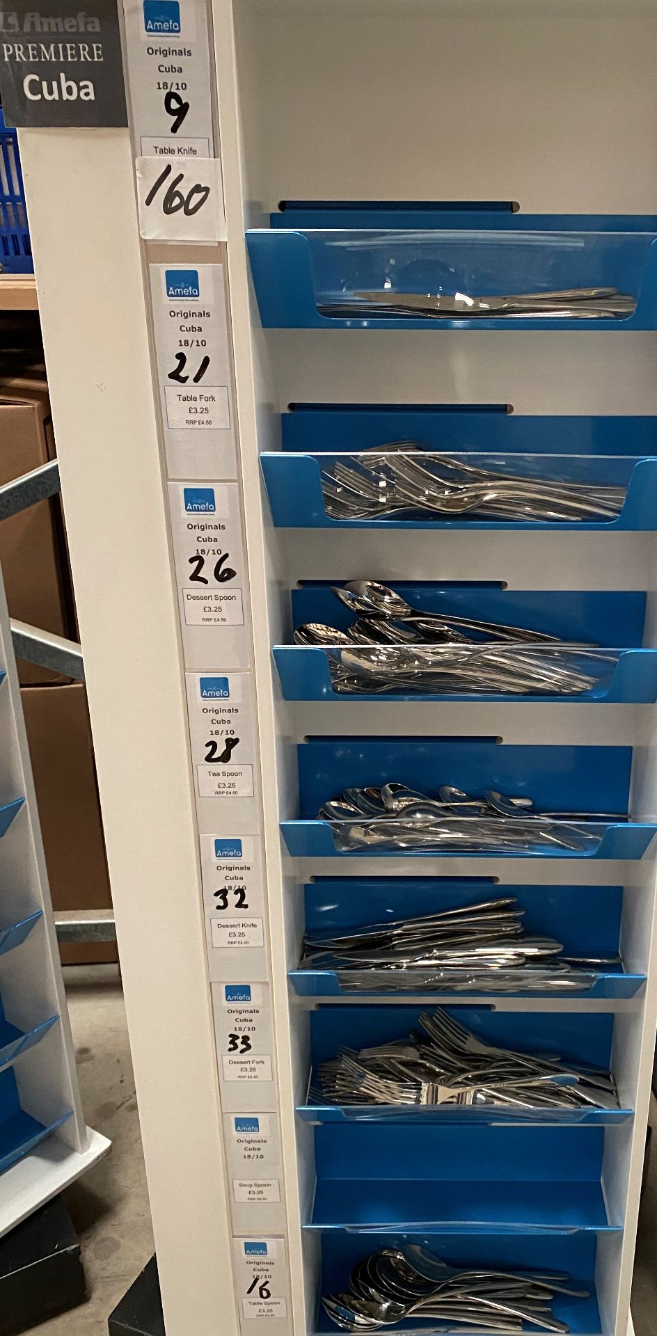 Contents to one side of an 8 shelf display - 160 pieces of Amefa Cuba cutlery - including knives,