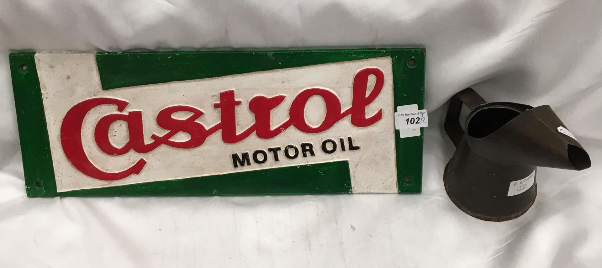 A cast metal Castrol Motor Oil sign,