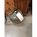 A large glass wine/spirit flagon approximately 56cm high