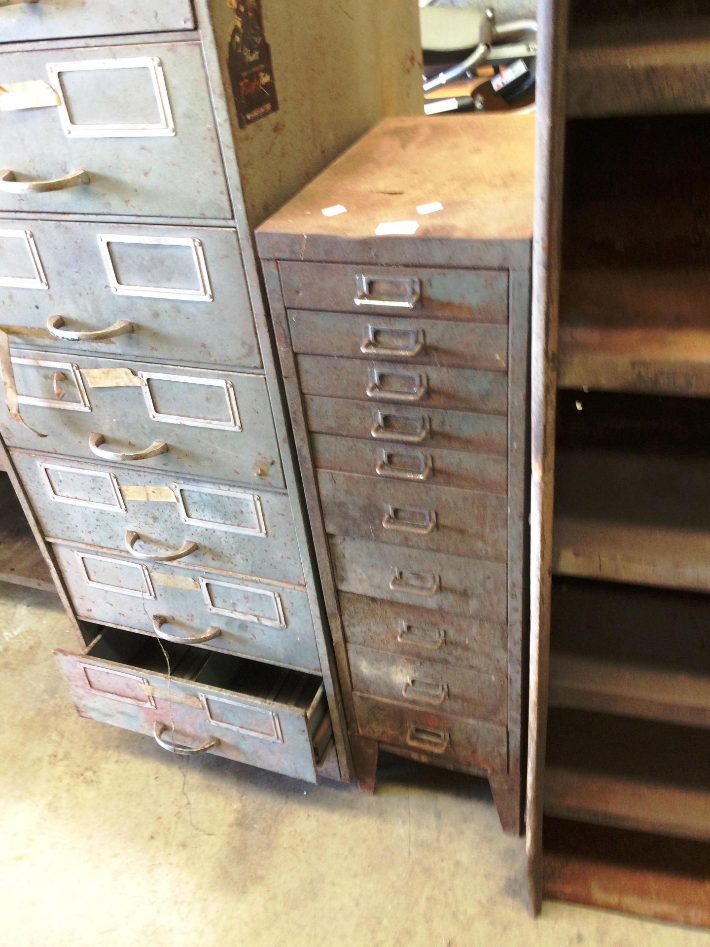 A metal ten drawer index cabinet