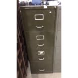 A Roneo Vickers green metal four drawer filing cabinet complete with key