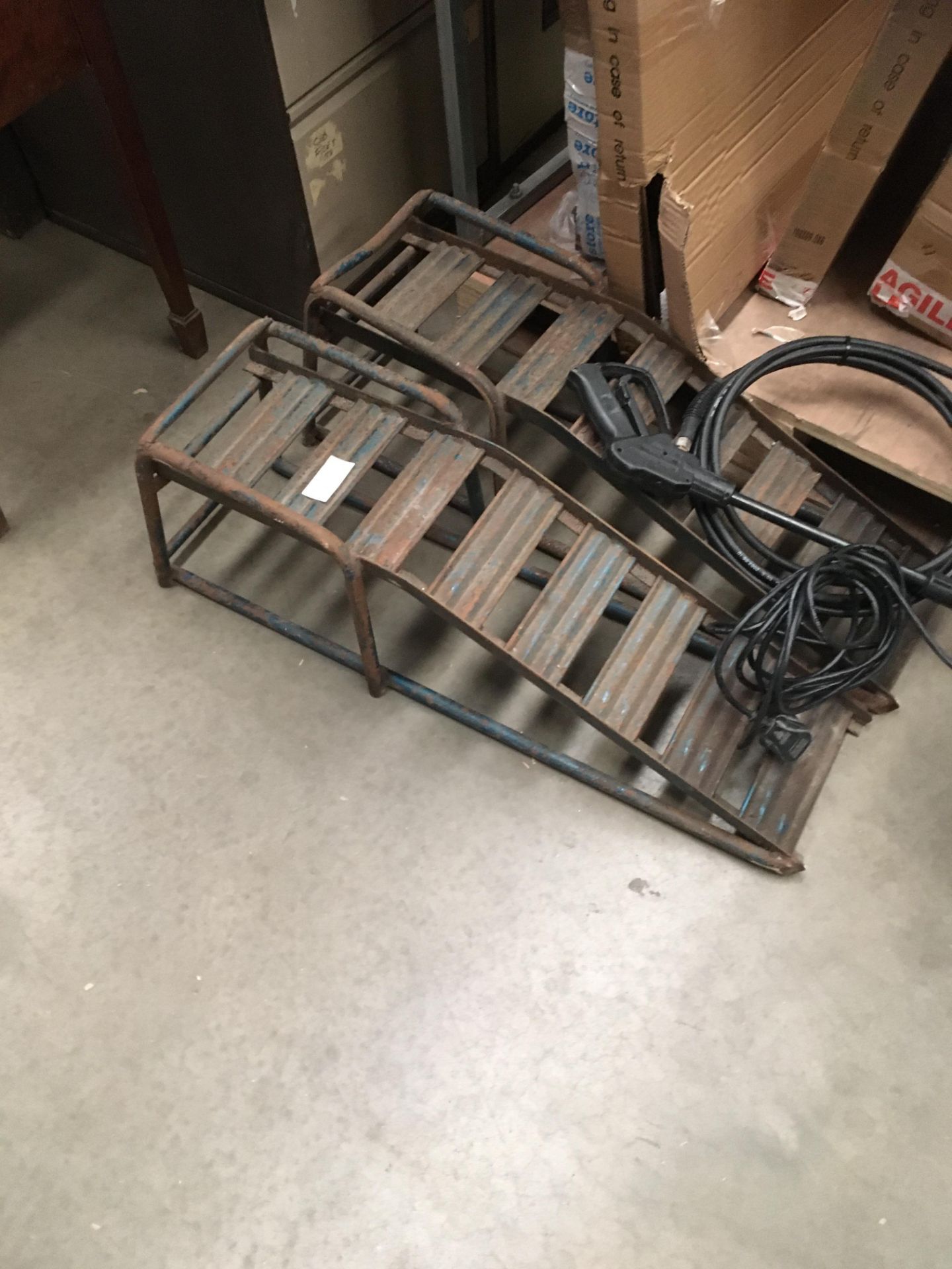 Pair of blue metal car ramps