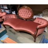A mahogany framed Edwardian style parlour room settee upholstered in deep buttoned pink dralon