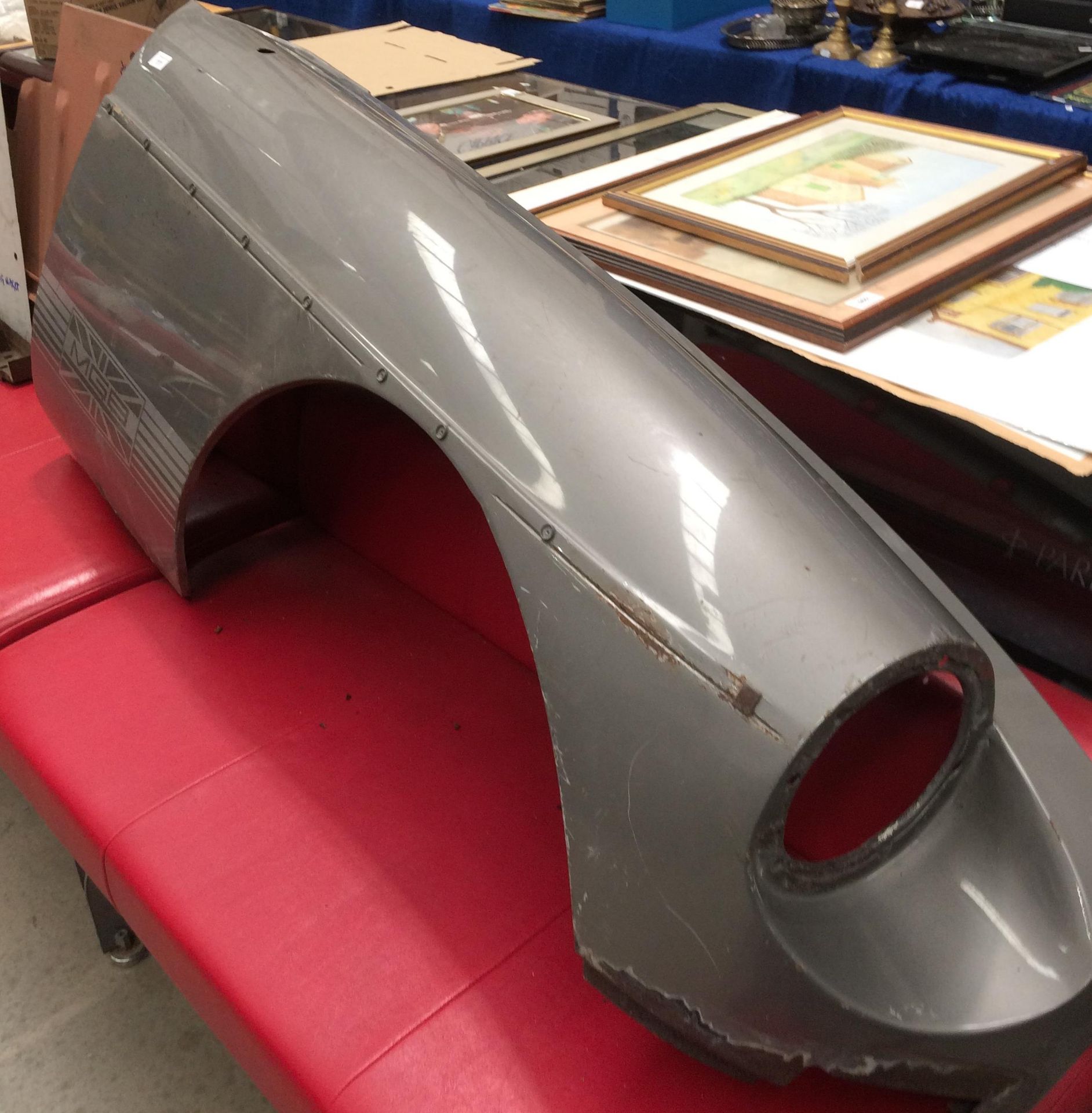 An MGB offside front wing and three various body panels/post for an MG Midget