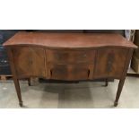 A reproduction mahogany serpentine front sideboard,