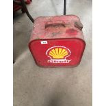 A Shell red metal portable petrol can