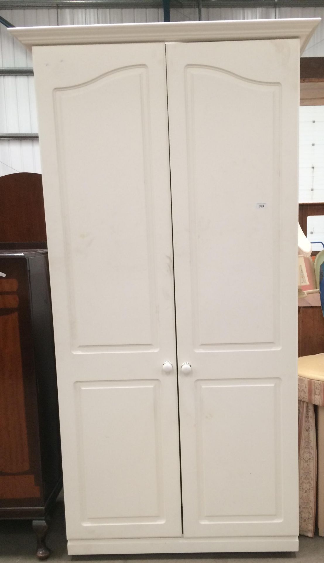 A white laminate two door wardrobe 90cm x 200cm high by Igoe Furniture