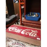 A red Coca-Cola metal sign 25 x 60cm