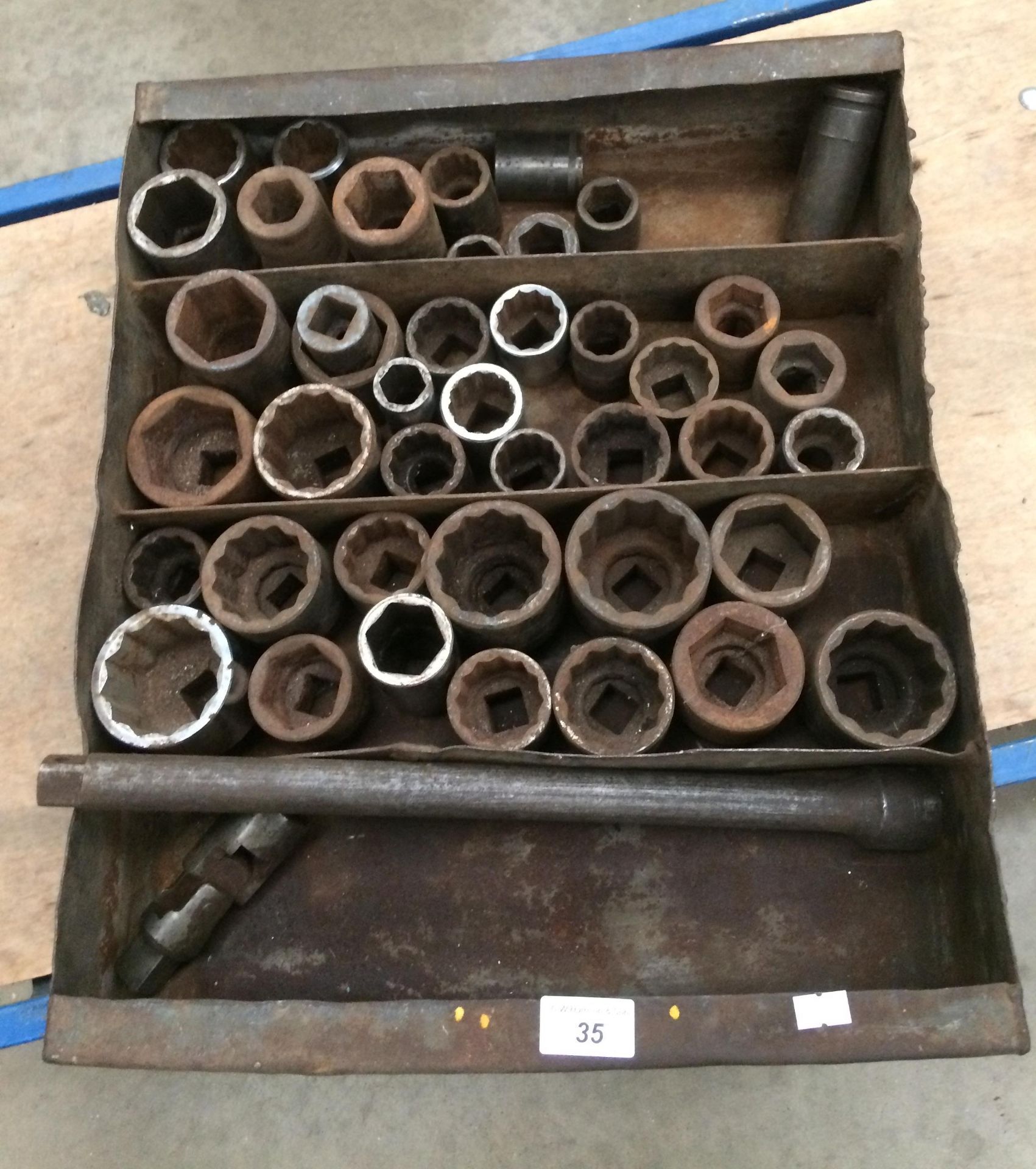Metal tray containing approximately 42 various sockets