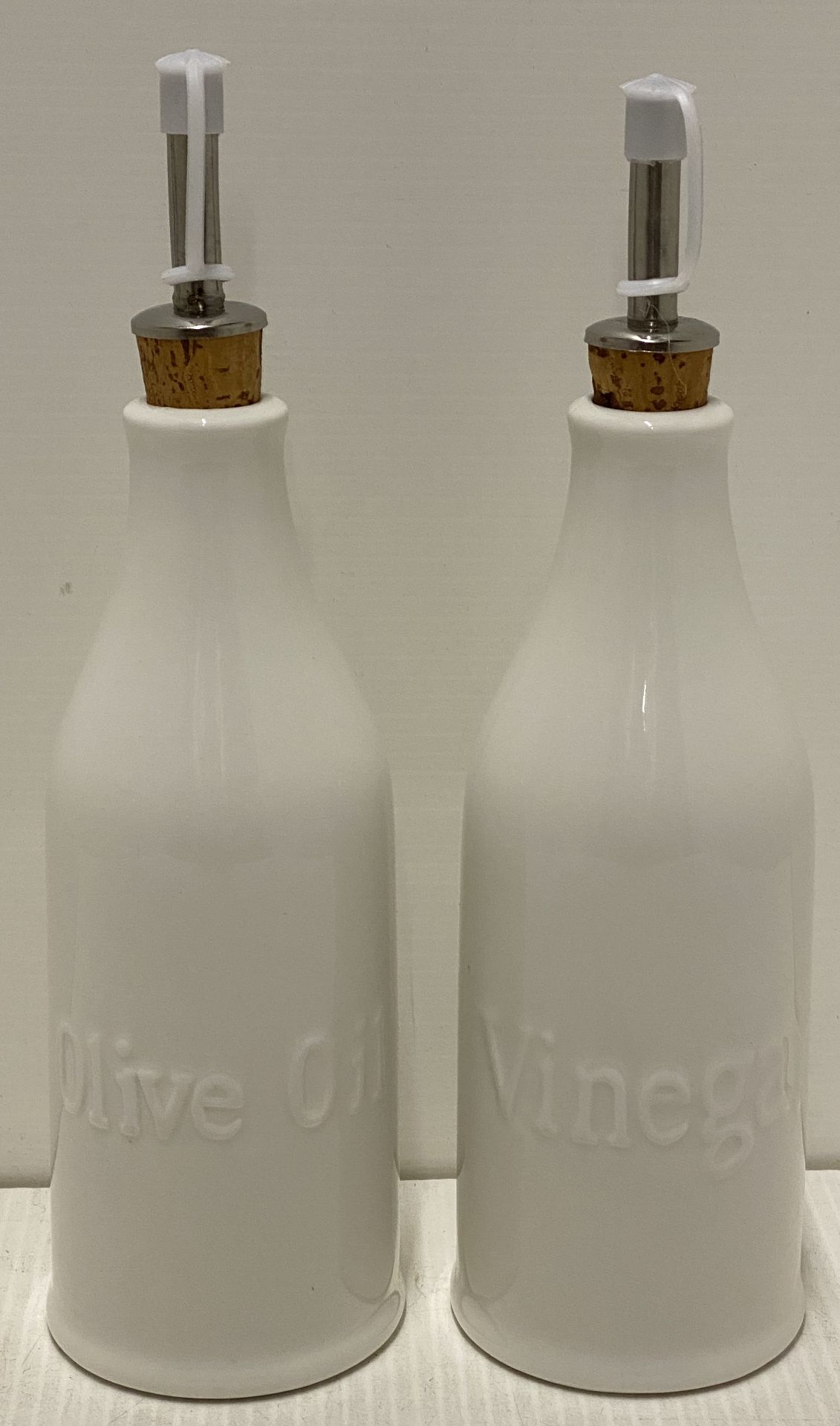 4 sets of 2 ceramic oil and vinegar pour