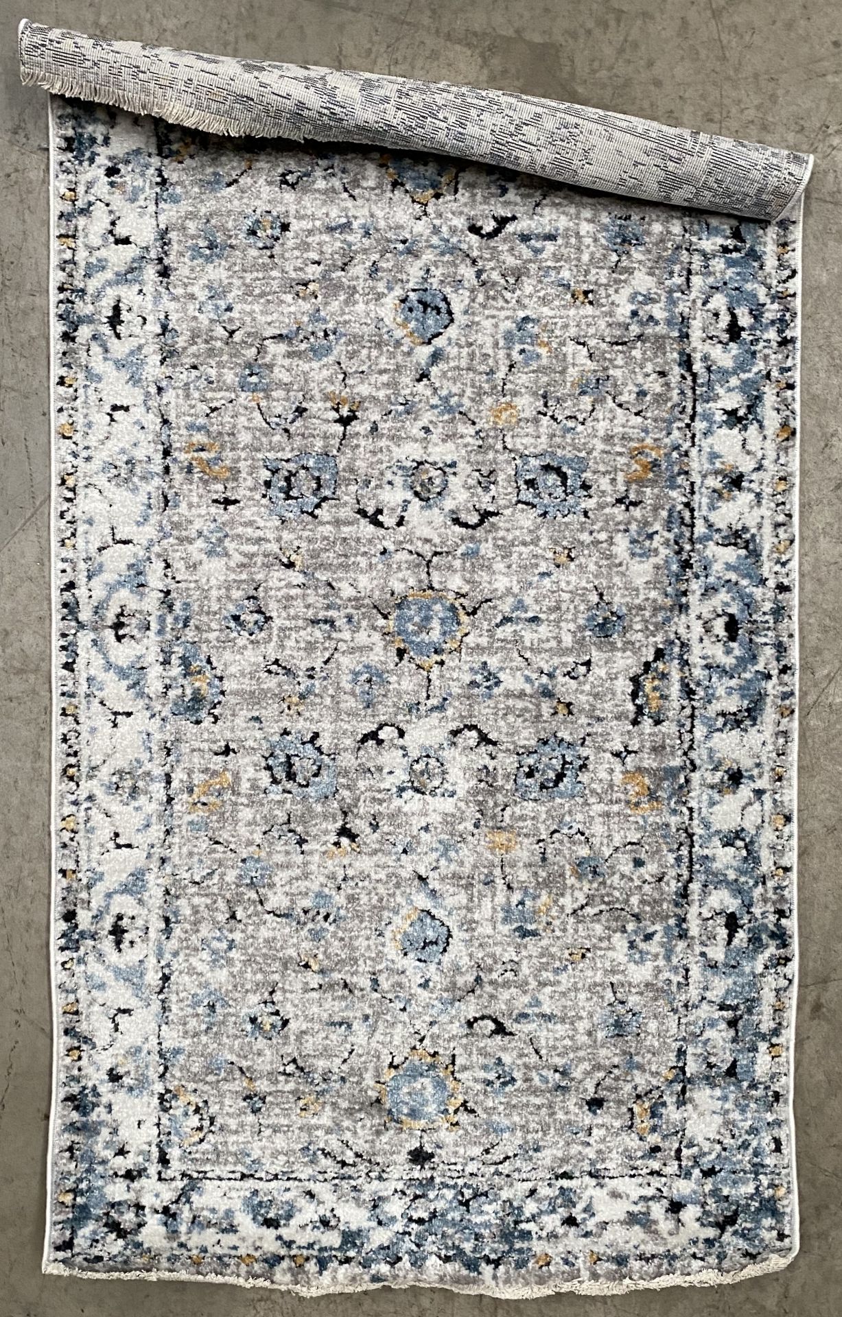 A Kukoon Rugs.