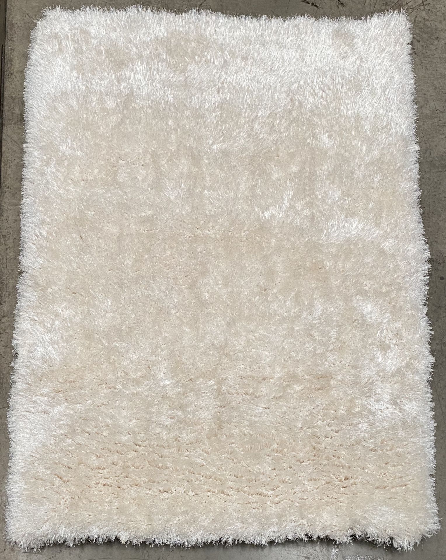 A Cimc Home RG0022-M0-WH shaggy cream rug - 140cm x 200cm