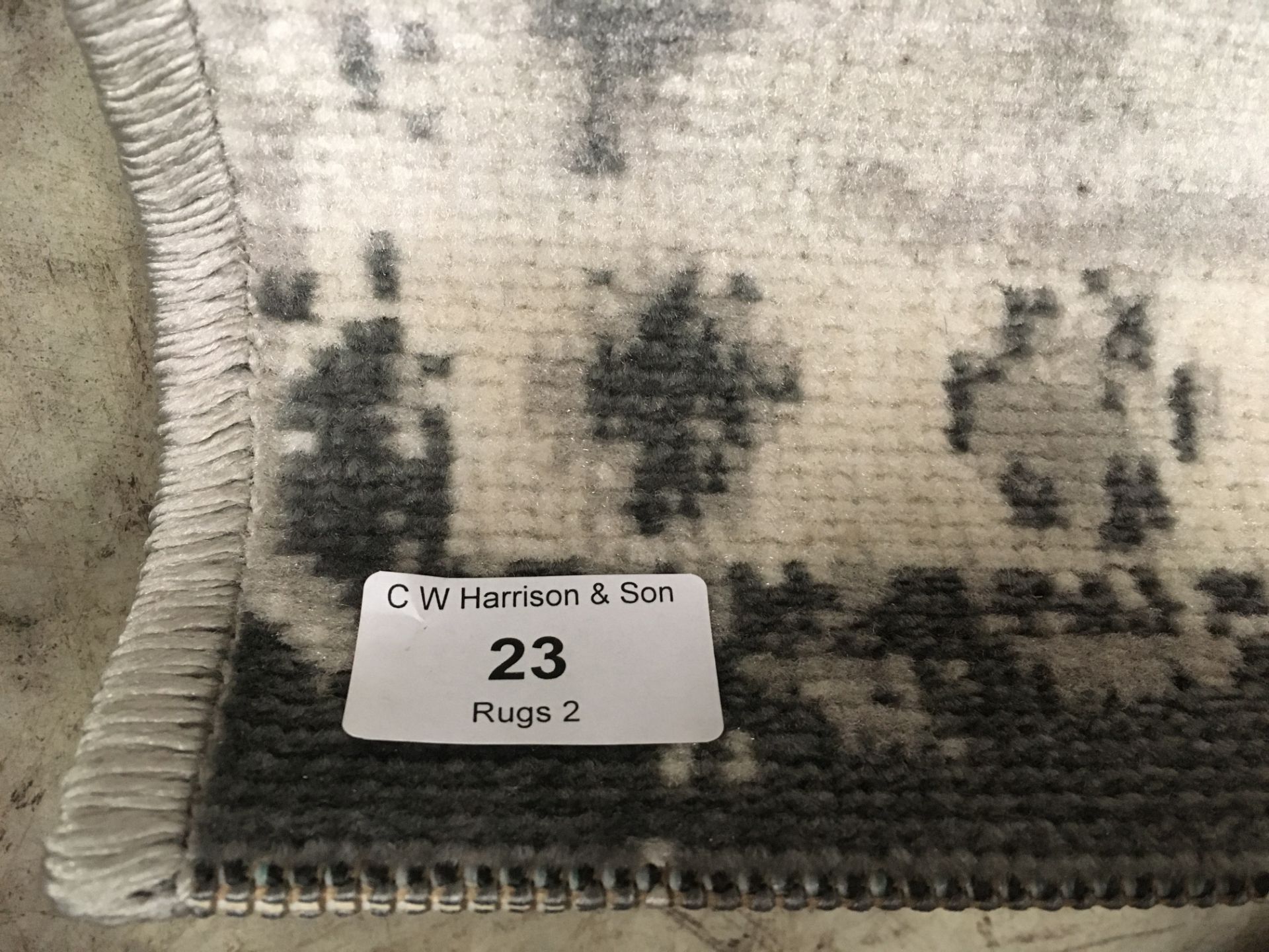 A modern grey and beige faded patterned short pile rug - 220cm x 160cm - Image 2 of 2