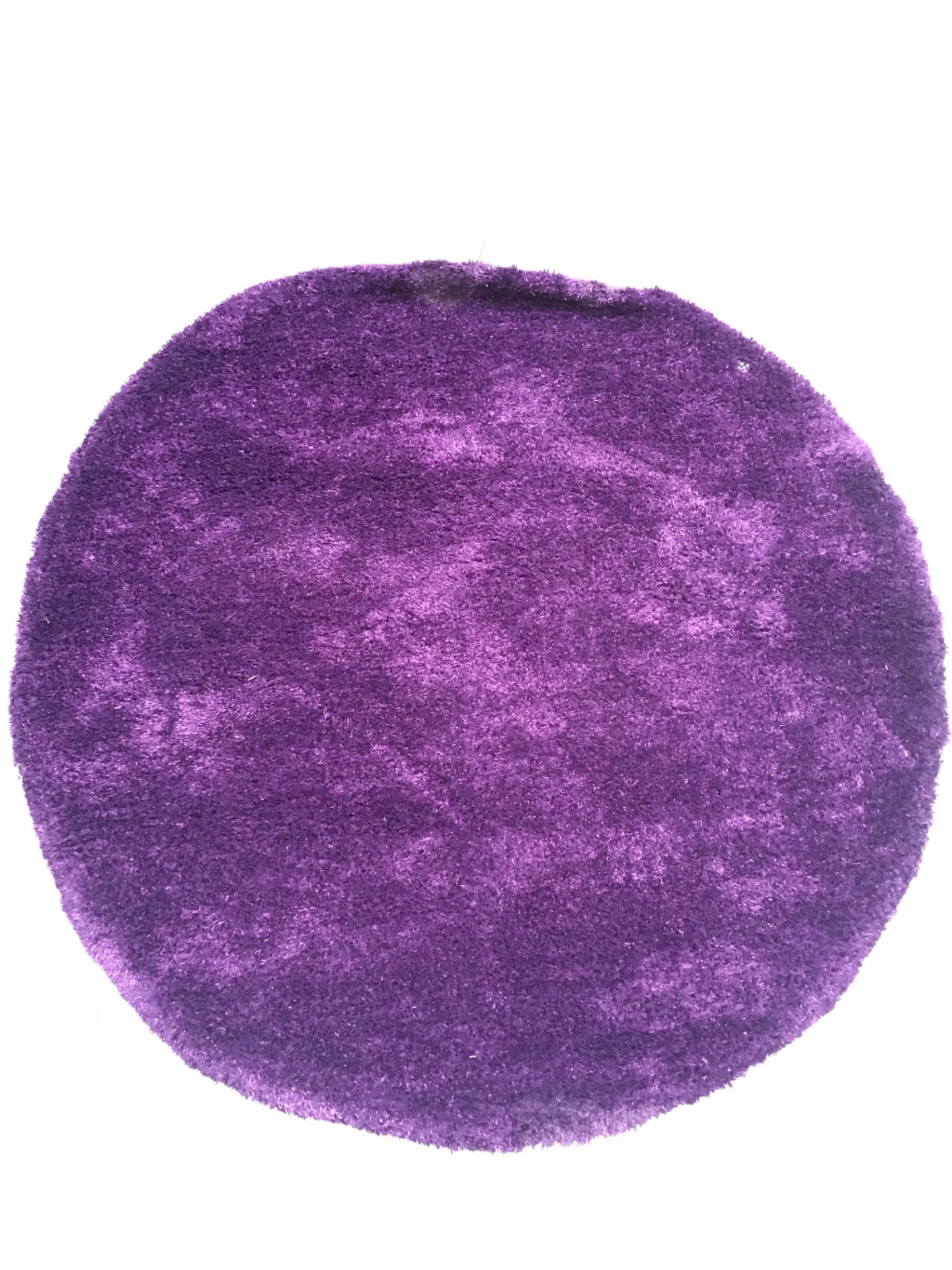 A Tom Tailor Uni purple rug - 140cm round