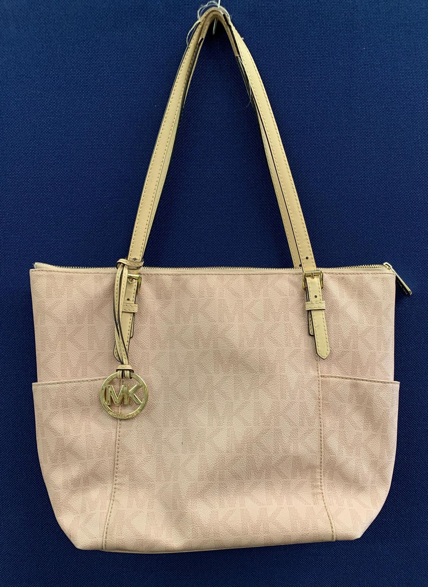 A Michael Kors light pink handbag