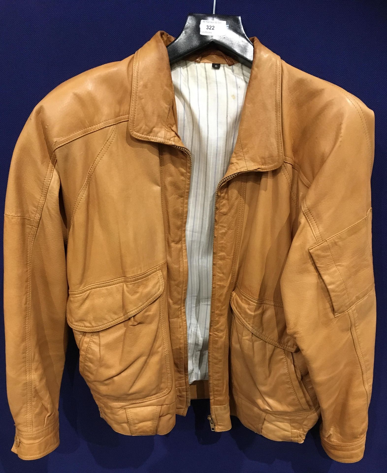 A gents brown leather jacket size S