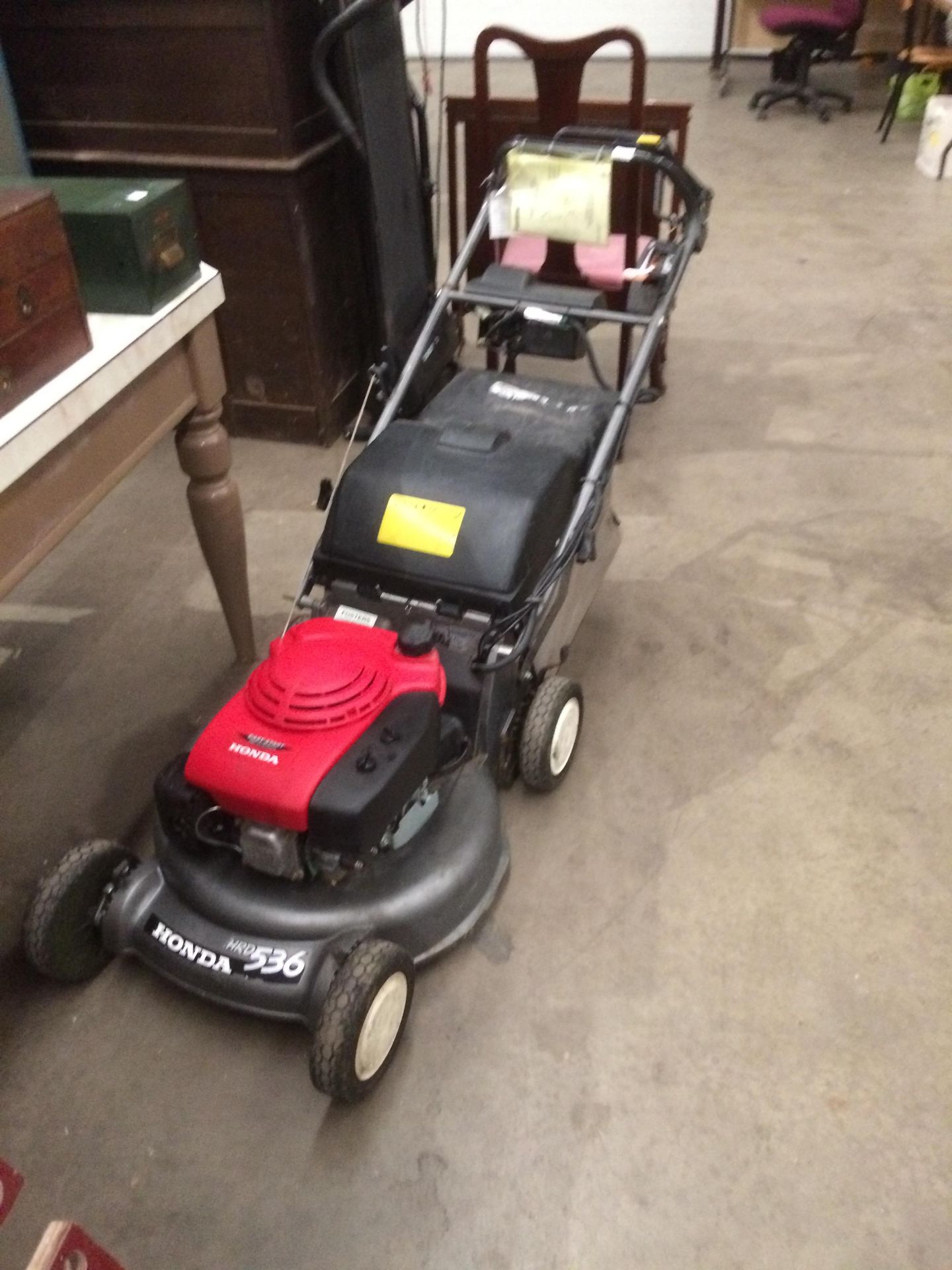 A Honda HRD 536 petrol rotary lawnmower with electric start, collection bag and manual. - Image 2 of 5