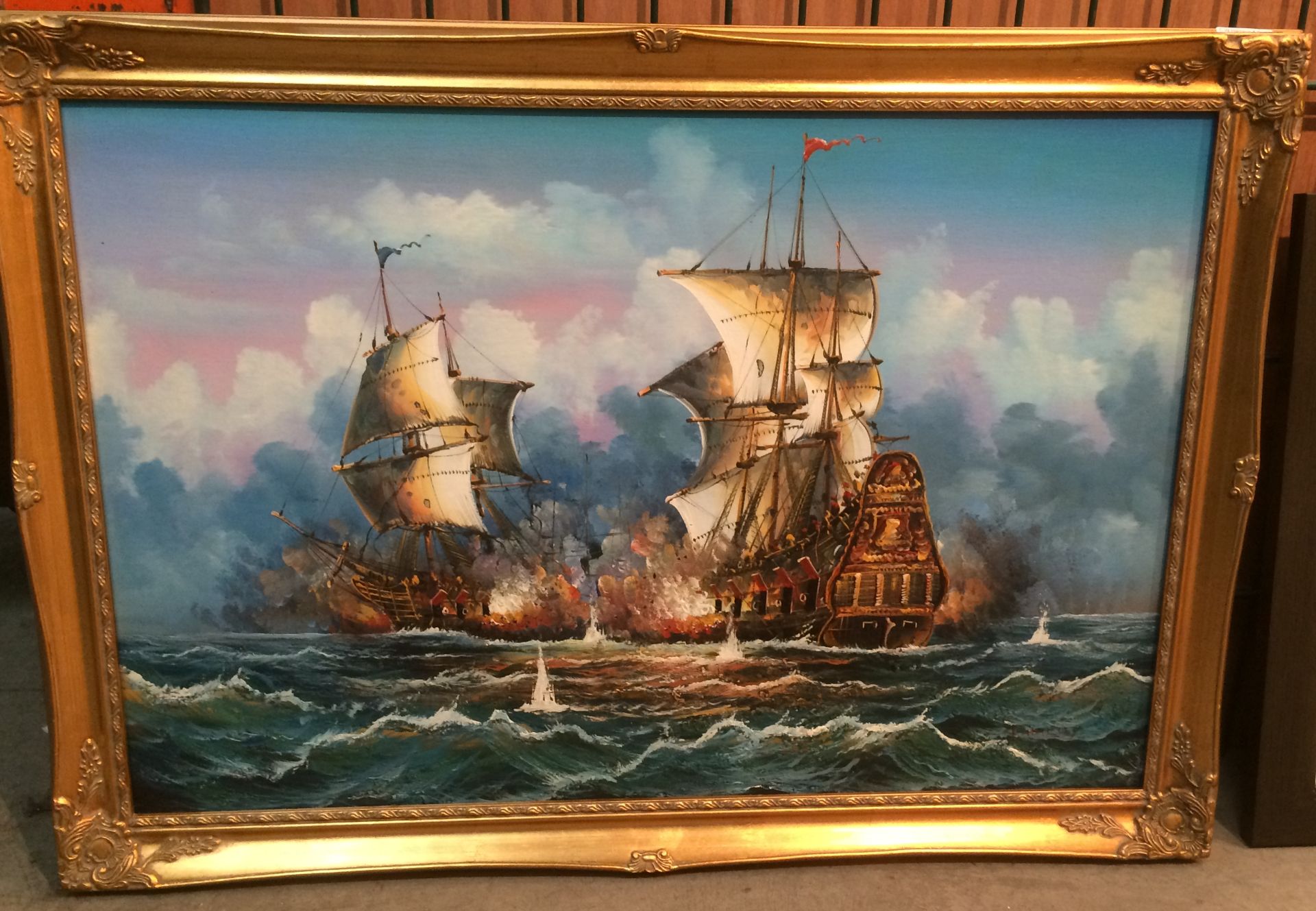 Gilt framed oil painting 'Sea Battle' 50 x 74cm