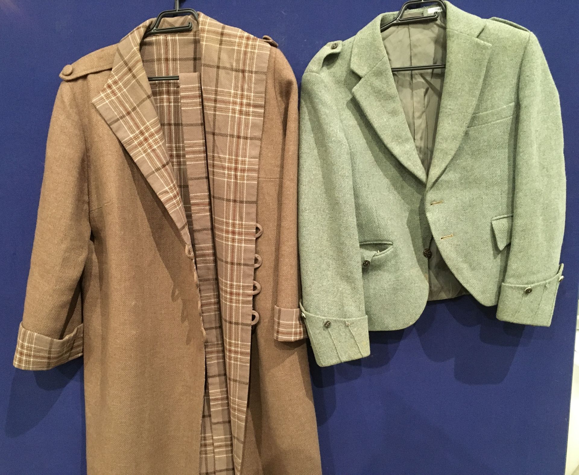 The Tartan gift shop ladies short green tweed jacket and a ladies long brown tartan lined jacket