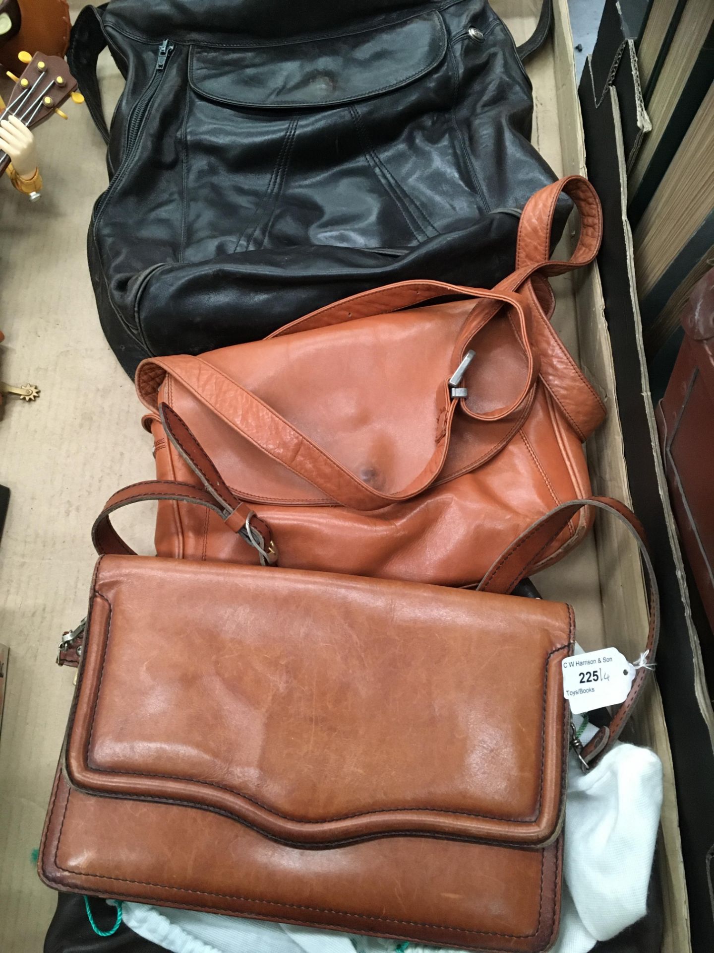 Four ladies handbags in brown and black by Enny, Italy etc.