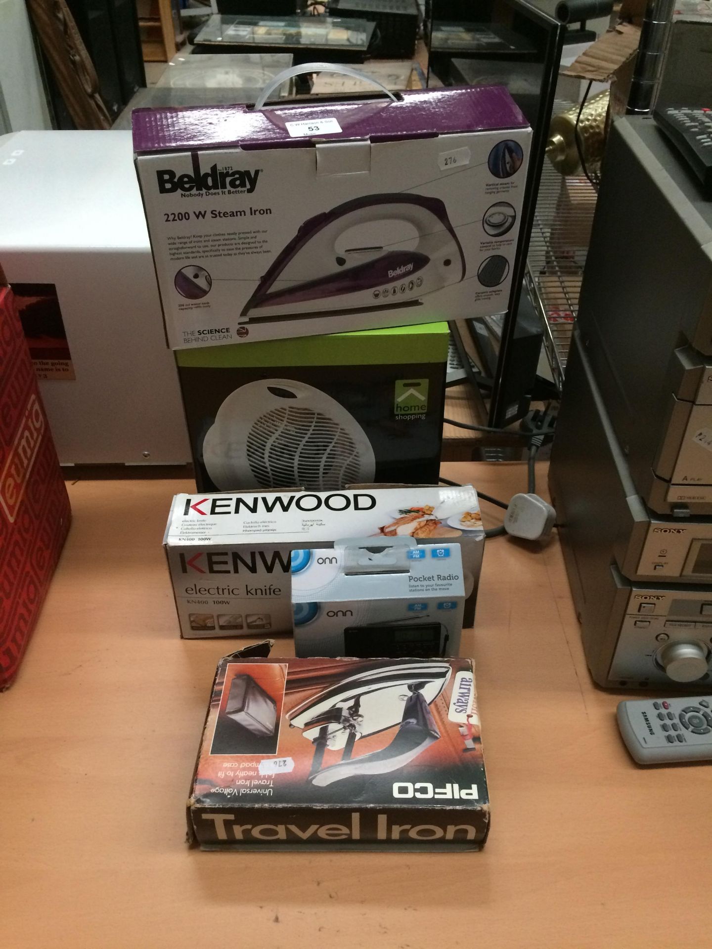 Five items - Pifco travel iron, ONN pocket radio, Kenwood electric knife,