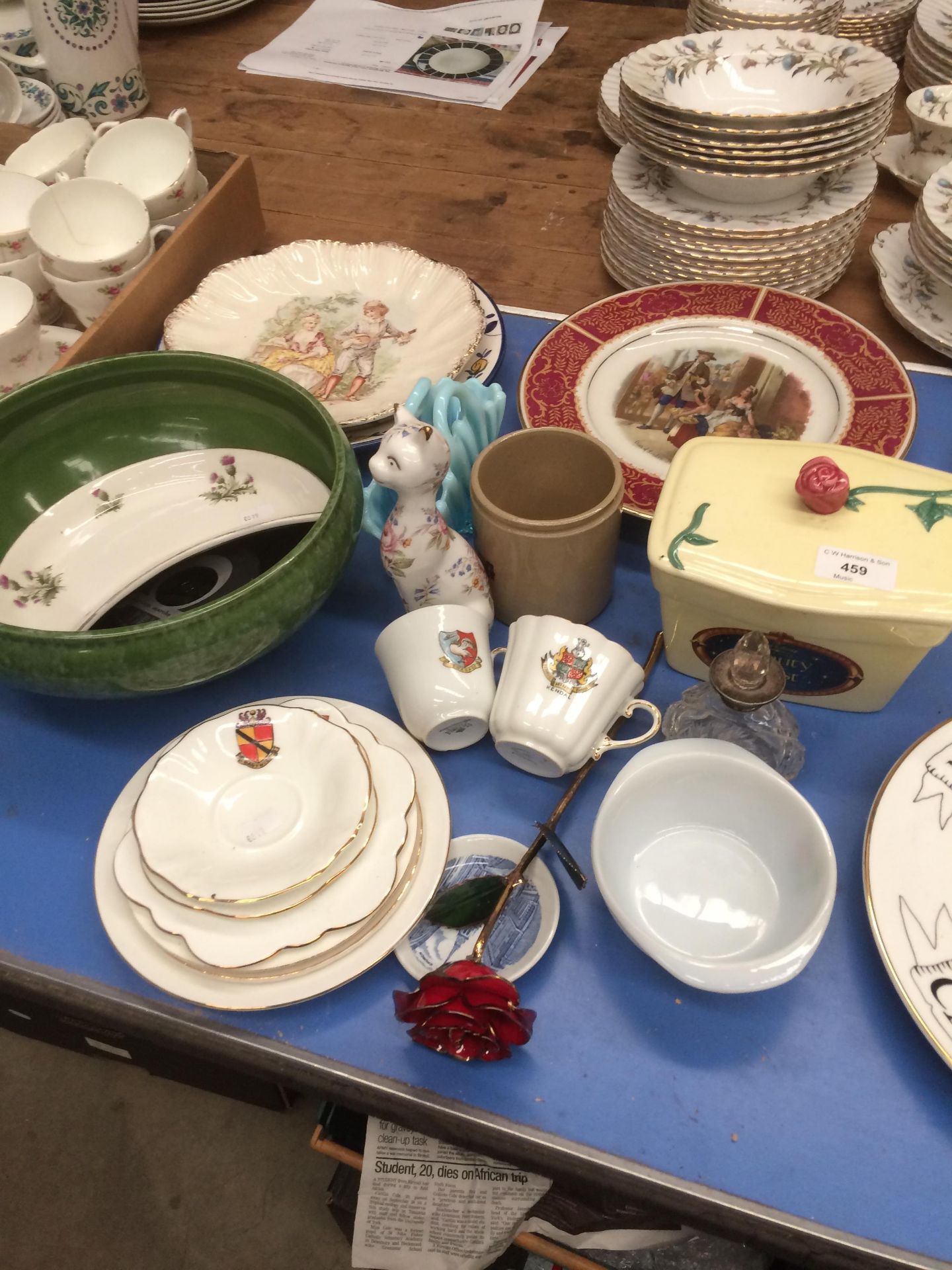 Remaining contents to table top, green glazed bowl, Goss and other crested china cups,