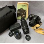 A Nikon D7000 digital camera together with a Nikon Nikkor AFSDX 18-55mm lens,