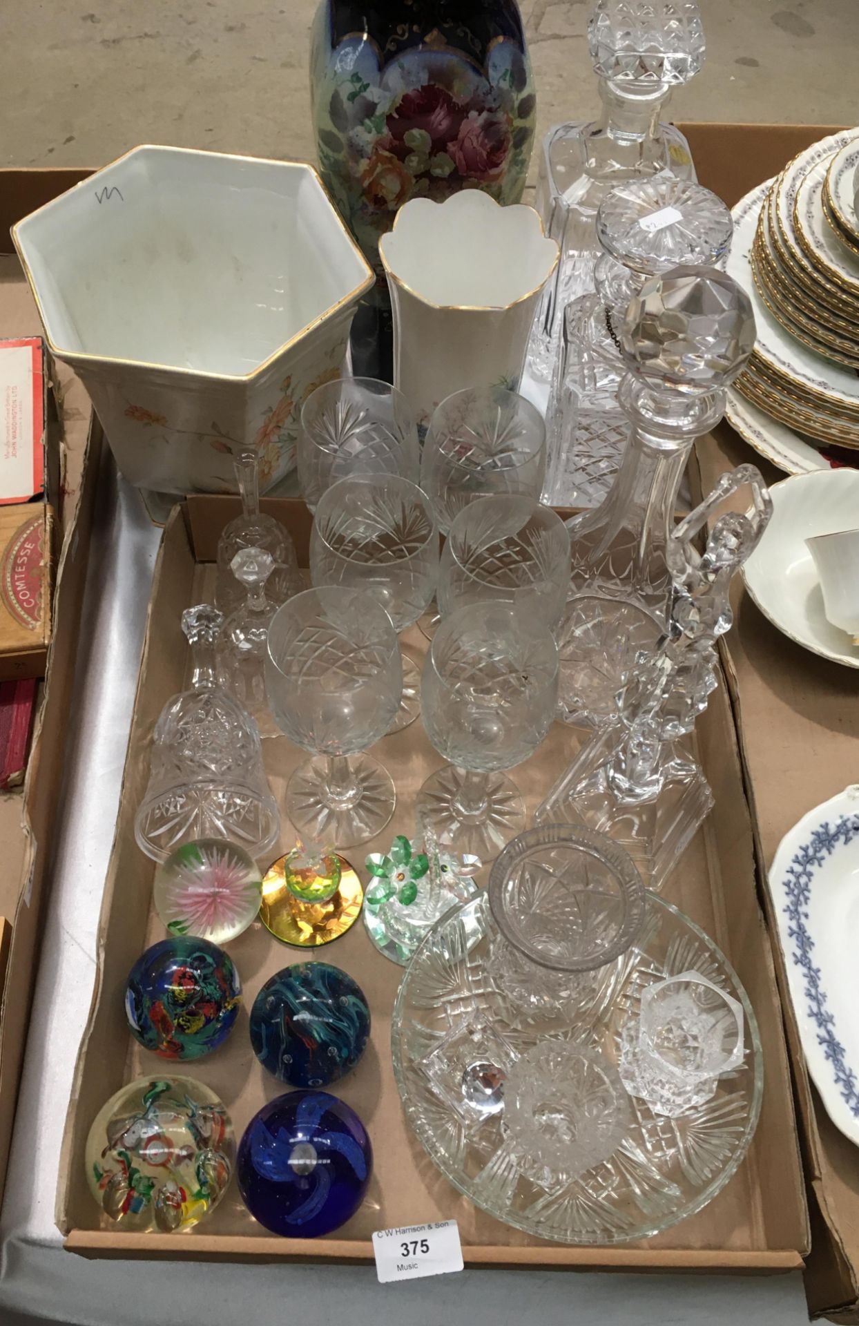 Contents to tray 3 glass decanters, a glass sculpture of a ballet dancer, 5 glass paperweights,