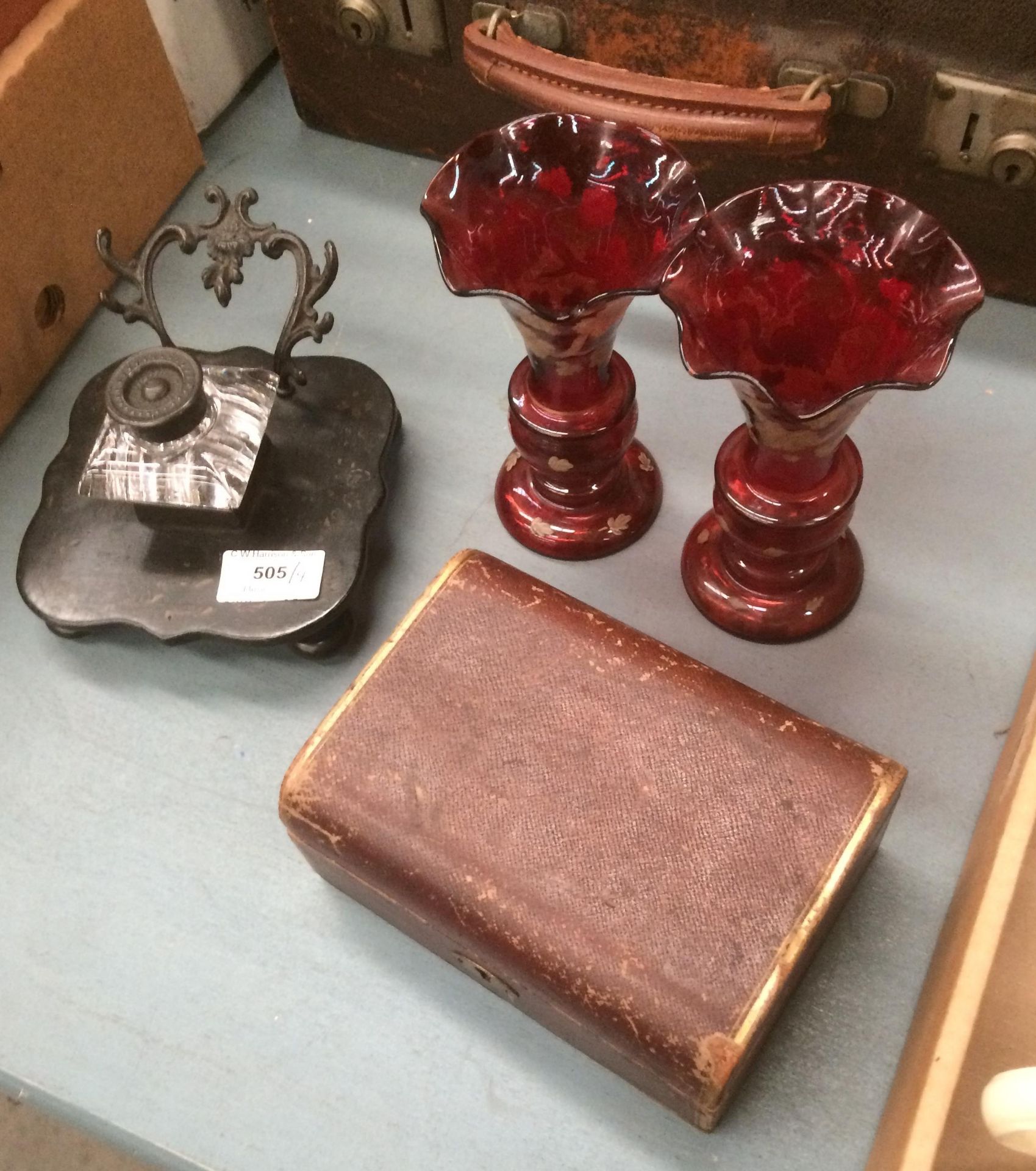 Two small cranberry glass vases,