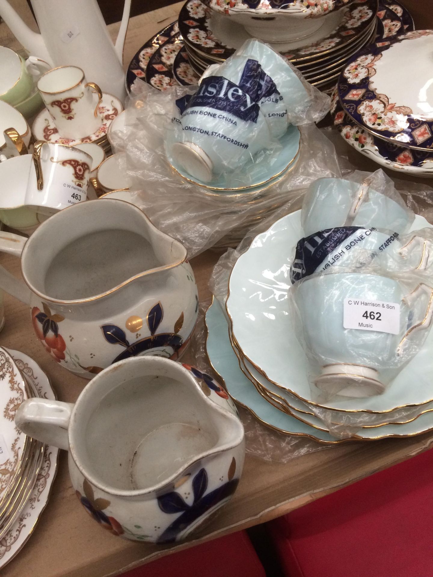 Twenty-four pieces of Aynsley fine bone china blue floral patterned part tea service and two