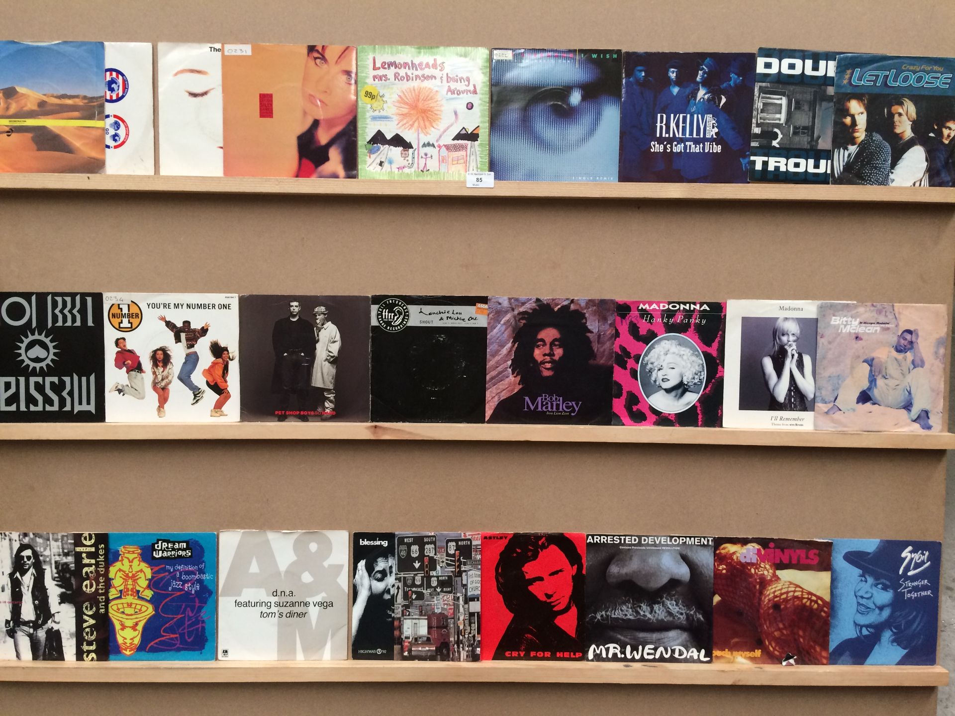 185 x assorted 7" vinyl records mainly 80s/90s - Lemonheads, Bob Marley, Madonna,