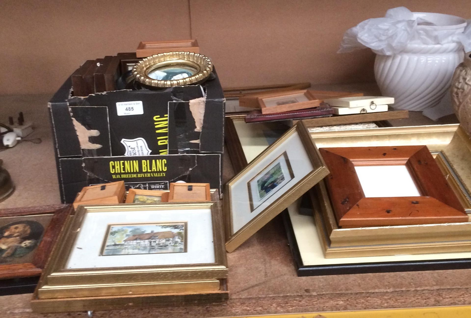 Contents to part of rack - a large quantity of small framed prints,