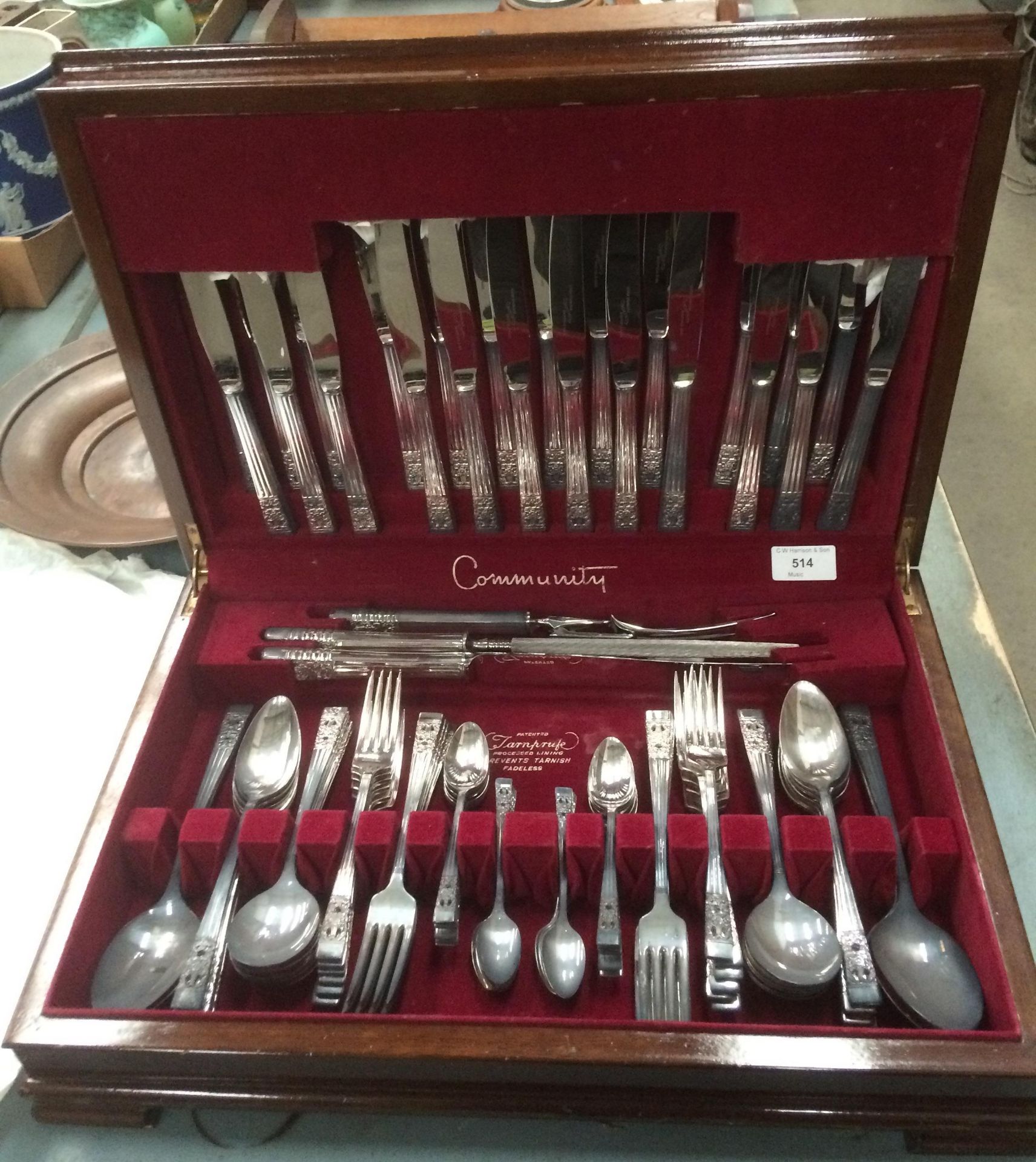 A Community 103 piece canteen of cutlery in a walnut finish case