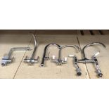 Five assorted kitchen mixer taps in chrome and brushed chrome *subject to VAT