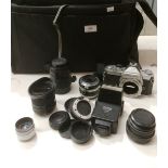 A camera bag and contents - Nikkormat camera body, a Vivitar Auto Thyristor,