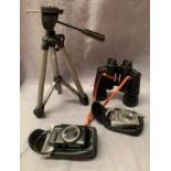 A Canon Powershot 5 x 260 HS camera in bag, a FujiFilm Finepix camera,