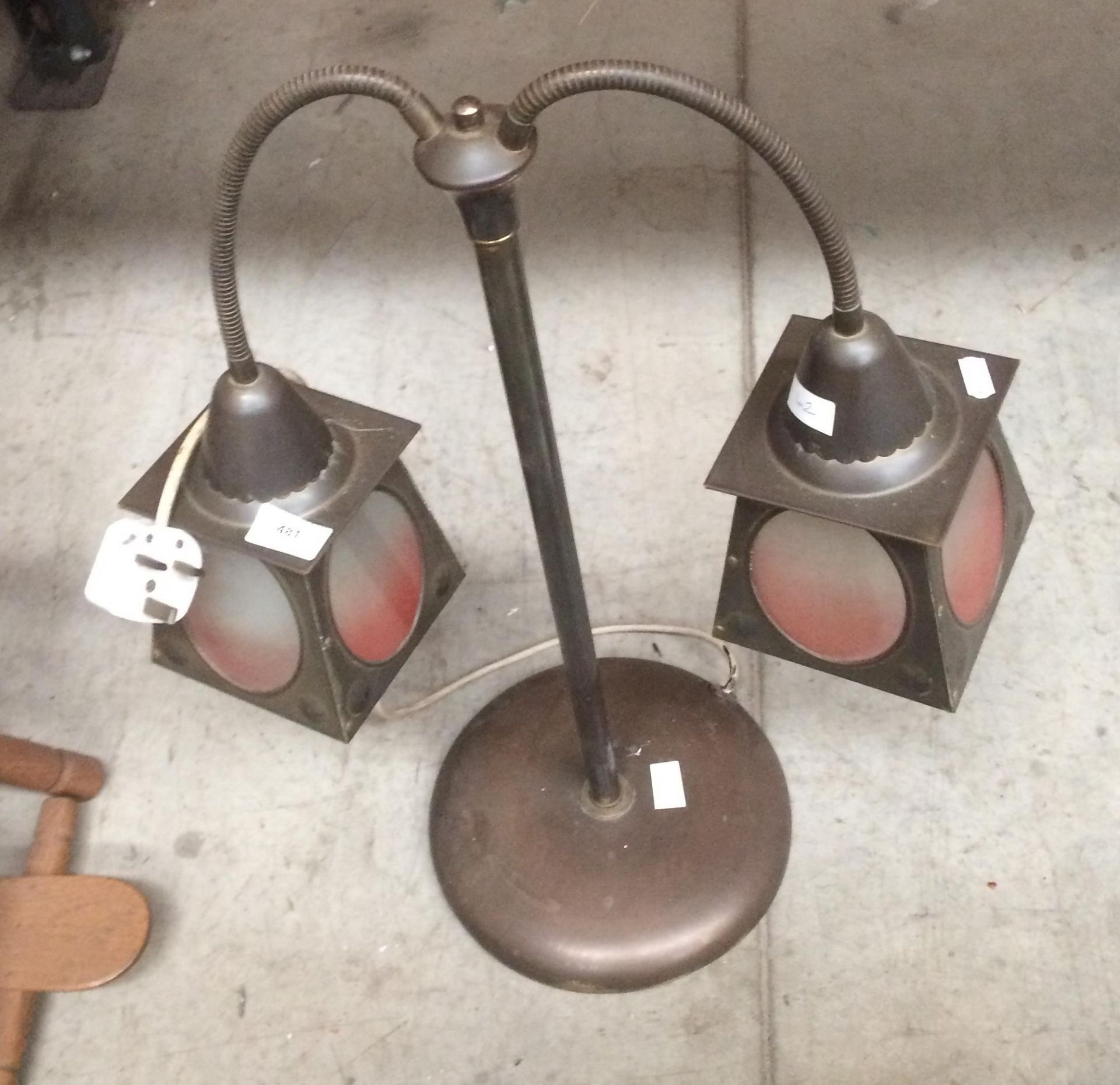A brass 240v twin lantern head lamp 60cm high